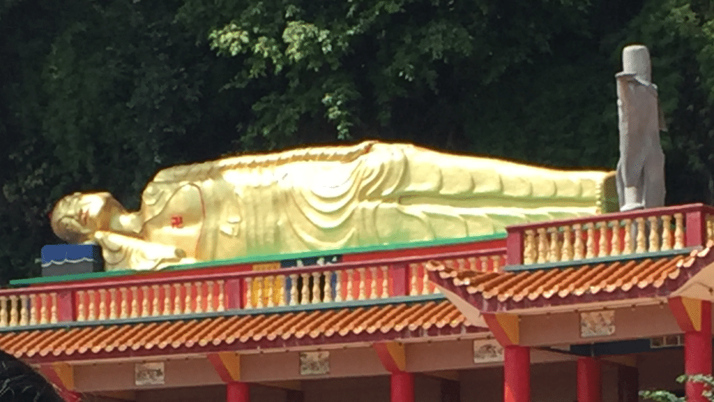 Sleeping Buddha Outside Temple