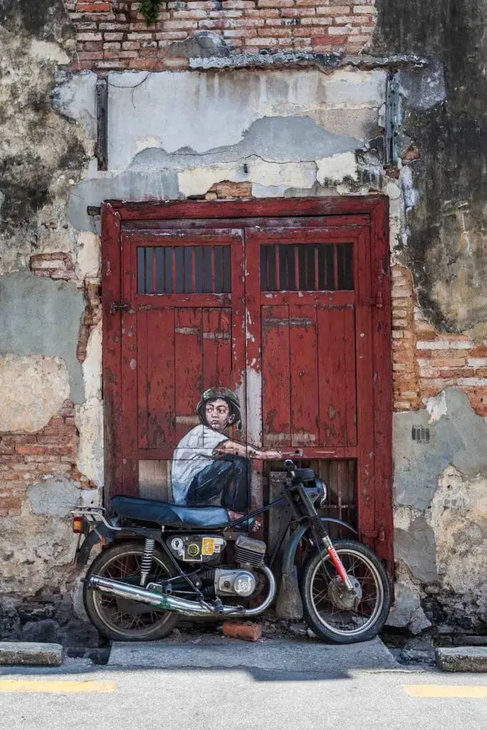 Penang street art mural kid on bike